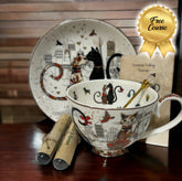 Whimsical cat-themed teacup and saucer set for tea leaf reading and mystical practices